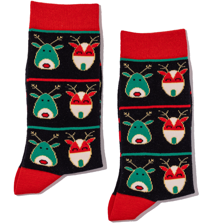 Pair of socks with reindeer pattern on a black background