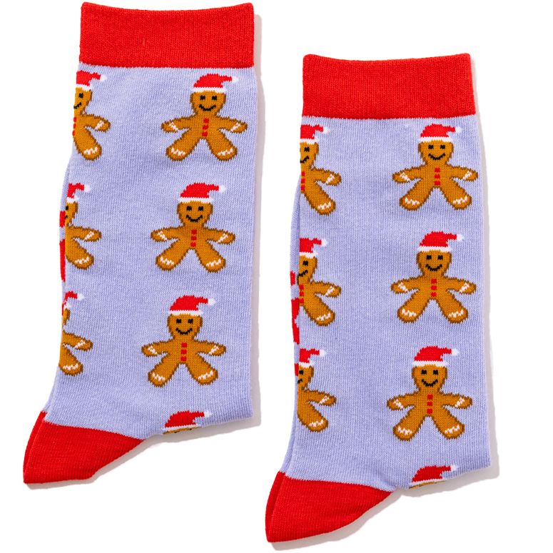 Pair of socks with gingerbread man pattern on a light blue background