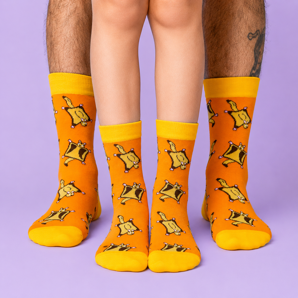 Father & Child's legs wearing matching Suar Glider socks from Jolly Soles